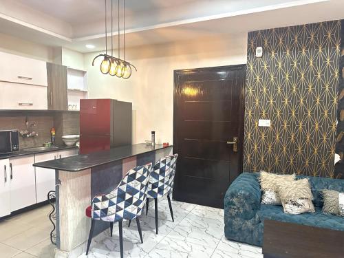 Kuchyň nebo kuchyňský kout v ubytování Two Bed Luxury Apartment