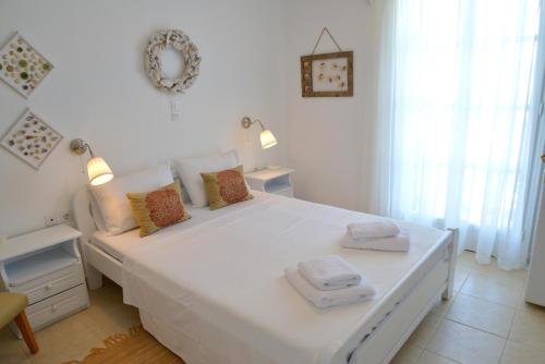 Katil atau katil-katil dalam bilik di Heliotropio Studios & Apartments