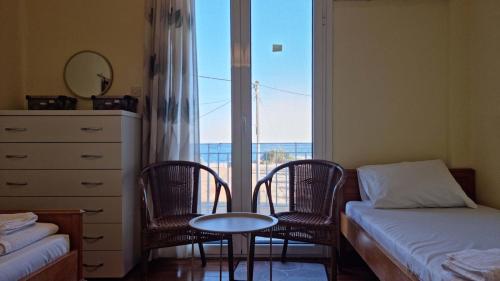 Ένα ή περισσότερα κρεβάτια σε δωμάτιο στο Anna's Beach House