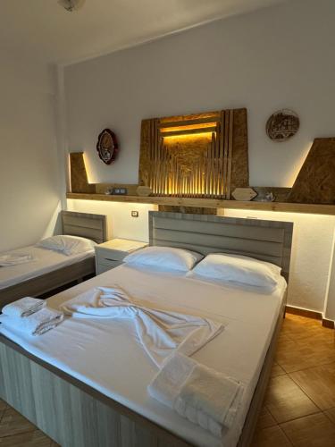 Postel nebo postele na pokoji v ubytování Guest House Toska