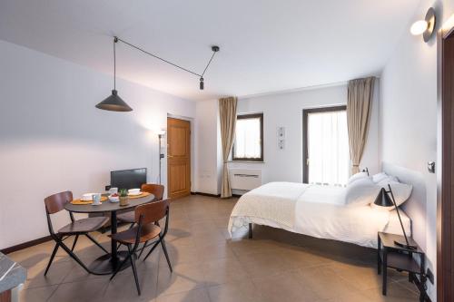 Ένα ή περισσότερα κρεβάτια σε δωμάτιο στο Cascina 6b