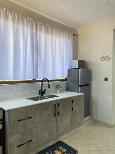 Cucina o angolo cottura di Fantasea Villa