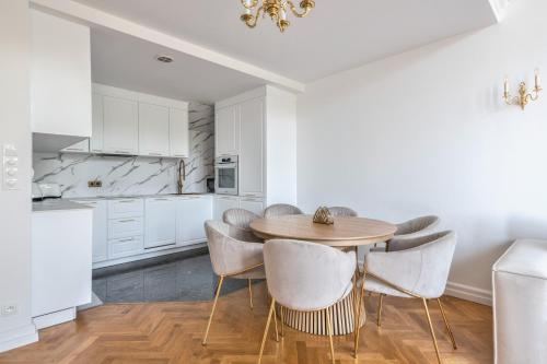 Η κουζίνα ή μικρή κουζίνα στο Ogrodowa Premium by NorthSide Apartments