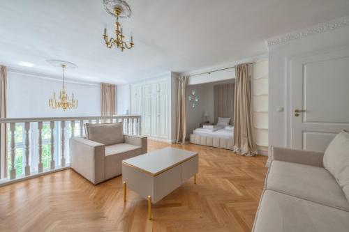 Ένα ή περισσότερα κρεβάτια σε δωμάτιο στο Ogrodowa Premium by NorthSide Apartments