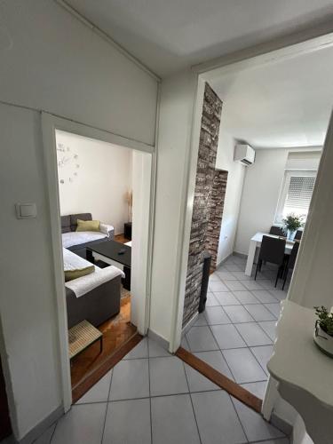 Ένα ή περισσότερα κρεβάτια σε δωμάτιο στο Apartman Papac
