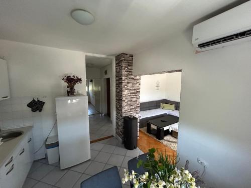 Η κουζίνα ή μικρή κουζίνα στο Apartman Papac
