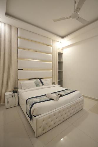 Katil atau katil-katil dalam bilik di Hotel The Grand Paradise