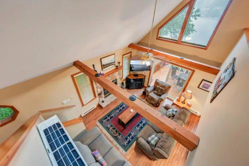 an overhead view of a living room with a loft at beautiful lakefront lodge in Lake Harmony