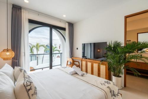 Кровать или кровати в номере Amal Villa #2 Canggu