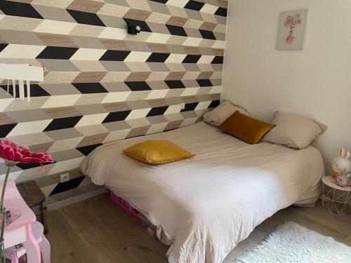 Katil atau katil-katil dalam bilik di Appartement cocooning Sarrians