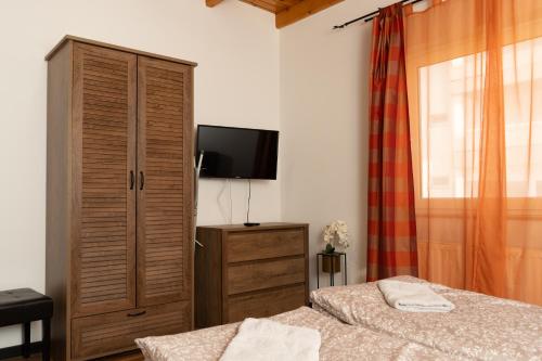 Postel nebo postele na pokoji v ubytování Borostyán Apartmanház