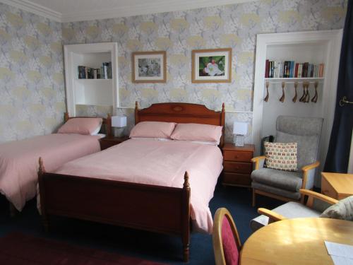 Ένα ή περισσότερα κρεβάτια σε δωμάτιο στο Athollbank Guest House