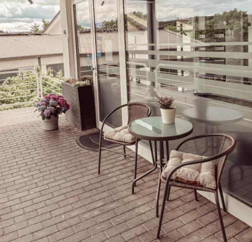 Un balcón o terraza en Komm' In Hotel