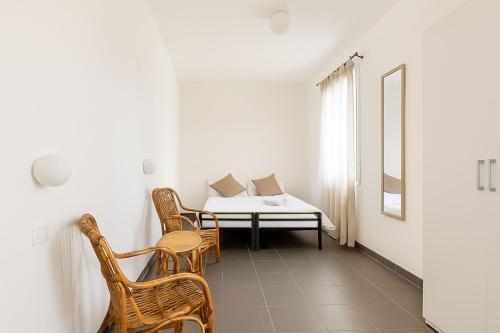 Postel nebo postele na pokoji v ubytování Altèra House