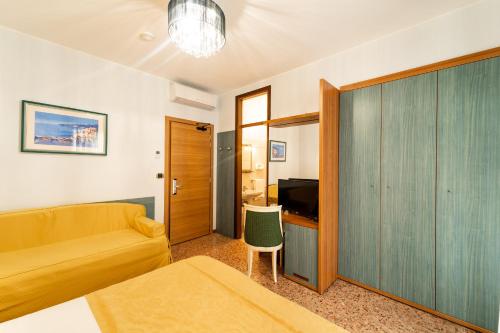 Postel nebo postele na pokoji v ubytování Hotel Souvenir
