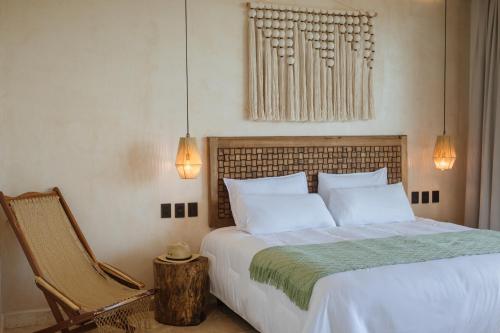 Katil atau katil-katil dalam bilik di Lalola Boutique Apartments by Andiani Travel