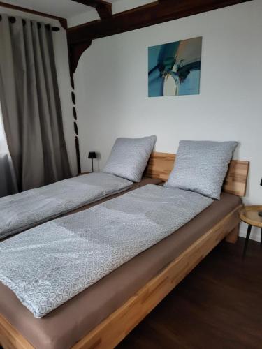 Una cama o camas en una habitación de Rustico Apartment in Emmetten