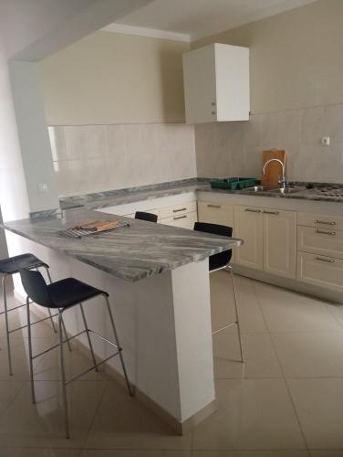 Una cocina o cocineta en Tarrafal Elegância