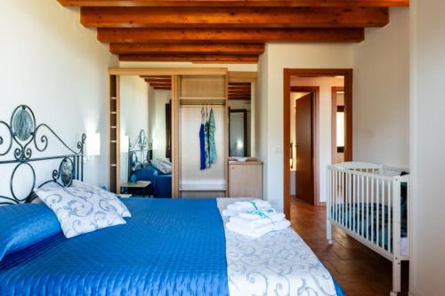 Ένα ή περισσότερα κρεβάτια σε δωμάτιο στο Agriturismo Dispenza