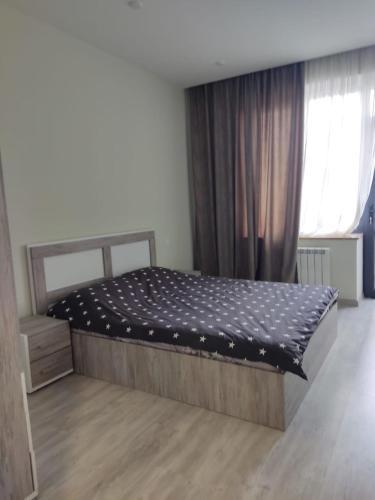 Katil atau katil-katil dalam bilik di Apartment On Argishti Steet,Centre