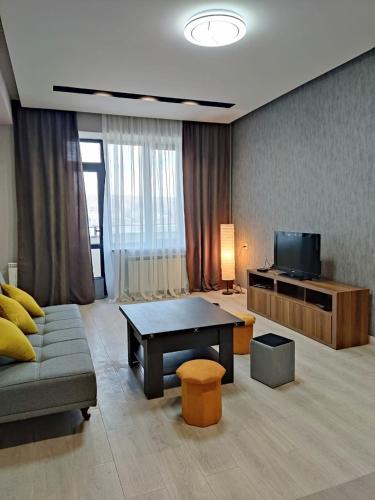 Televisyen dan/atau pusat hiburan di Apartment On Argishti Steet,Centre