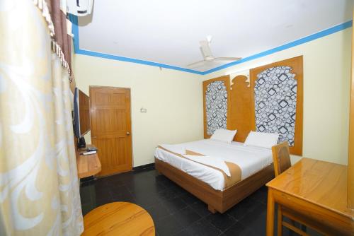 Katil atau katil-katil dalam bilik di HOTEL ASWINi GRAND LODGE