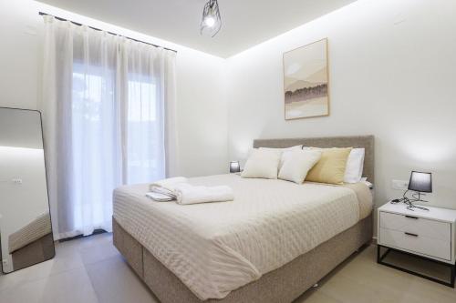 Giường trong phòng chung tại E&Y Luxury Apartment