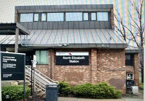 a brick building with a sign in front of it at Private 1st floor Apartment - Only 5 min Away from Newark Airport and 30 min to NYC in Elizabeth