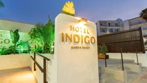 a sign for the hotel indico in front of a building at Hotel Indigo Gandia Beach by IHG in Gandía