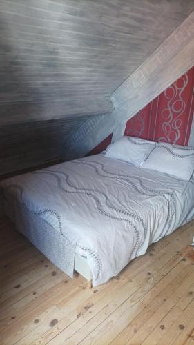 เตียงในห้องที่ Maison Le Nova