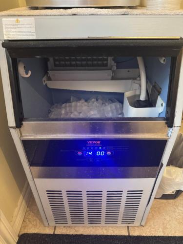 a computer system is sitting on a shelf at Lincoln Inn Fredericton in Fredericton
