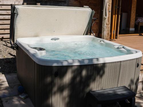 a jacuzzi tub sitting in a yard at The Chard in Carlisle