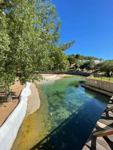 a view of a river from a bridge at Casa Valverde in Monsanto