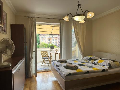 Voodi või voodid majutusasutuse Apartment Julia in the center of Karlovy Vary toas