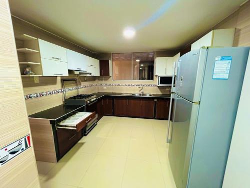 Una cocina o zona de cocina en departamento acogedor en la Molina