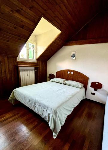 Ένα ή περισσότερα κρεβάτια σε δωμάτιο στο Casa Costanza