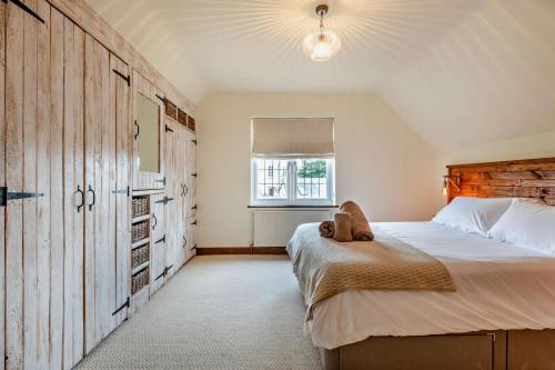 Voodi või voodid majutusasutuse Throop House Cottage - Bournemouth toas