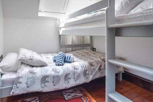 En eller flere senge i et værelse på The Barn @ Swanage Farm