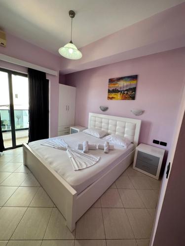 Cama o camas de una habitación en Hotel Kompleks Joni