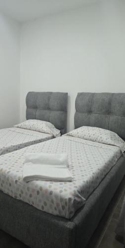 Postel nebo postele na pokoji v ubytování Le beau Mazagran