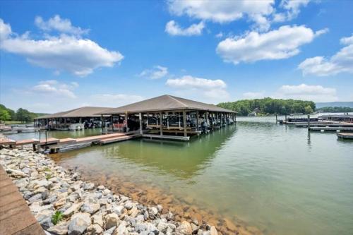 a pier with a restaurant on the water at The Pointe - Serenity Shores - 3204 in Huddleston