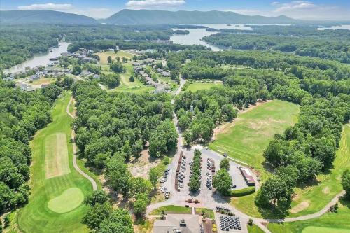 an aerial view of a golf course with a lake at The Pointe - Serenity Shores - 3204 in Huddleston