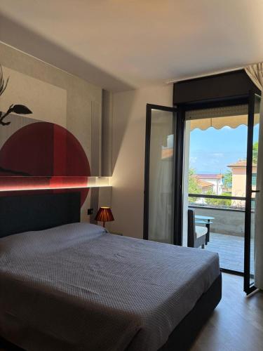 Кровать или кровати в номере Garda Sunset House