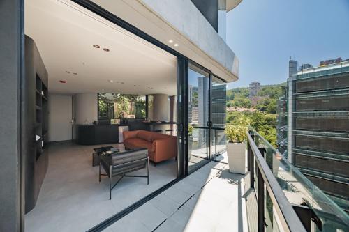 a view from the balcony of a building at Seissta Medellín in Medellín