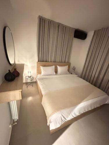 Ένα ή περισσότερα κρεβάτια σε δωμάτιο στο Mini villa