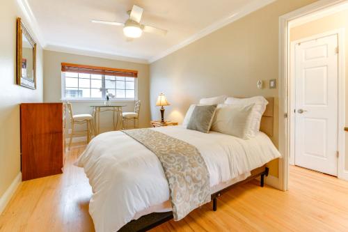 a bedroom with a large bed and a dining room at Easy SF Bay Access Updated San Pablo Duplex in San Pablo