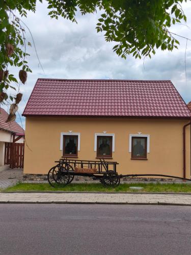 a bike parked in front of a building at Penzion u Bohdy in Jaroslavice