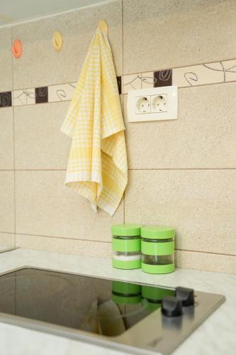 a towel hanging on a wall in a bathroom at Apartments Bućin in Kotor