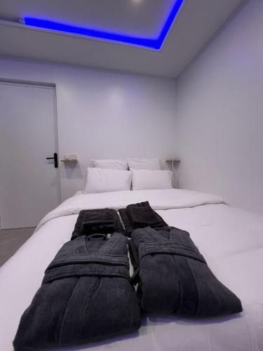 Ένα ή περισσότερα κρεβάτια σε δωμάτιο στο Suite Prestige Balnéo