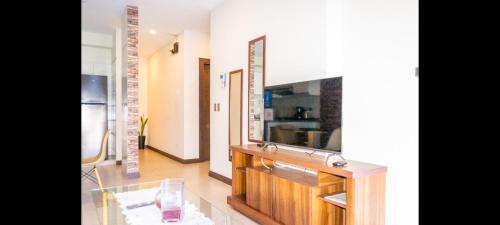 TV a/nebo společenská místnost v ubytování Edificio Juan 23